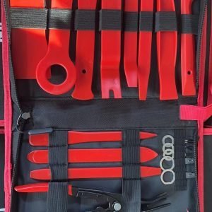 Full view of the 19-piece red and black trim removal tool set open on a clean white background.