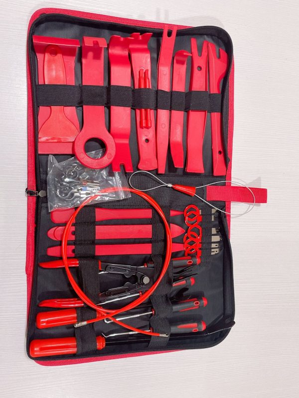Top-down view of the 42-piece master kit, highlighting the orange wire puller loop and the terminal crimping pliers in the center.