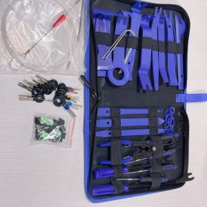 Top-down view of the 70-piece master kit, highlighting the bag of replacement hardware clips, the extended fish tape, and the blue nylon tools.