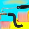 Black handled automotive hose removal hook with a curved hard steel pointed tip, 190mm long, used for pulling stuck coolant and fuel hoses off metal fittings.