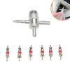 Silver 4-in-1 knurled valve core tool with a pointed threaded tip and six red rubber tire valve cores laid out below, used for car, truck, motorcycle and bike tires.