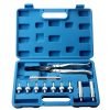 Open blue carrying case showing an 11-piece valve stem seal tool kit, including black-handled pliers, silver adaptors, and an extension bar neatly organized in molded slots.