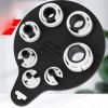 Seven piece white and black plastic fuel line disconnect tool set on a hanging board, sizes from 1/4 inch to 7/8 inch, used for removing car AC and fuel line quick connectors.