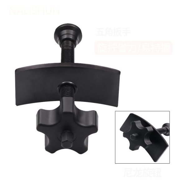 Full view of the black brake caliper press tool showing the ergonomic nylon knob and curved pressure plate.
