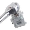 Close-up of the silver 34mm multi-functional brake wind-back adapter cube held in a hand to show scale.