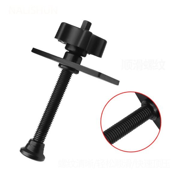 Full view of the black brake caliper press tool showing the ergonomic nylon knob and curved pressure plate.