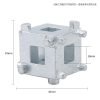 Close-up of the silver 34mm multi-functional brake wind-back adapter cube held in a hand to show scale.