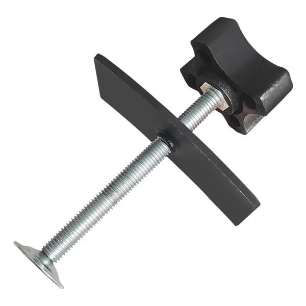 Full view of the black and silver brake caliper press tool showing the cross-handle and curved pressure plate.