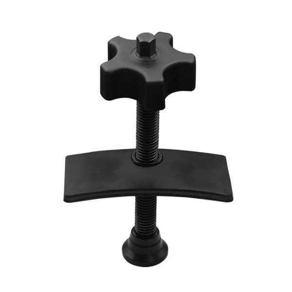 Full view of the black brake caliper press tool showing the ergonomic nylon knob and curved pressure plate.