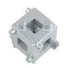Close-up of the silver 34mm multi-functional brake wind-back adapter cube held in a hand to show scale.