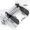 Full view of the silver and black duck-jaw brake caliper spreader showing the T-handle and wide jaw opening.