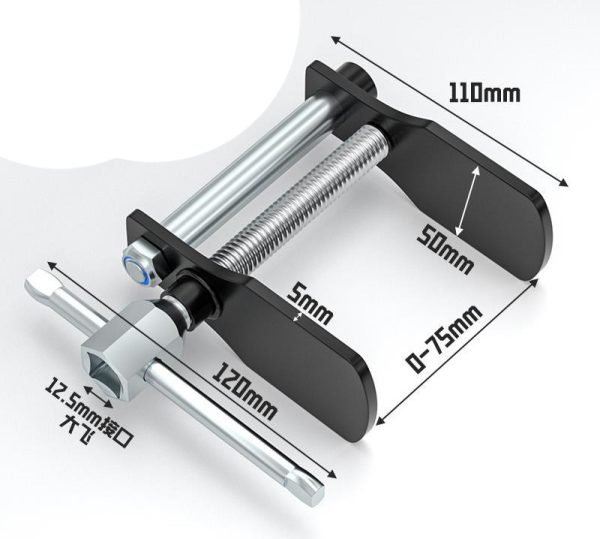 Full view of the silver and black duck-jaw brake caliper spreader showing the T-handle and wide jaw opening.