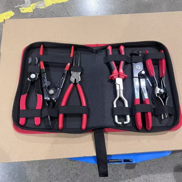 A professional 6-piece headlight removal and hose clamp pliers kit neatly organized in a black and red zippered carrying case.