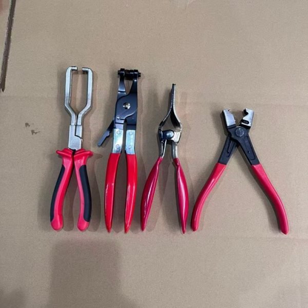 An overhead view of the 11-piece deluxe auto repair kit featuring pure red handle pliers, nylon trim removal tools, and electrical terminal extractors in a zippered case.