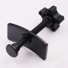 Full view of the black brake caliper press tool showing the ergonomic nylon knob and curved pressure plate.