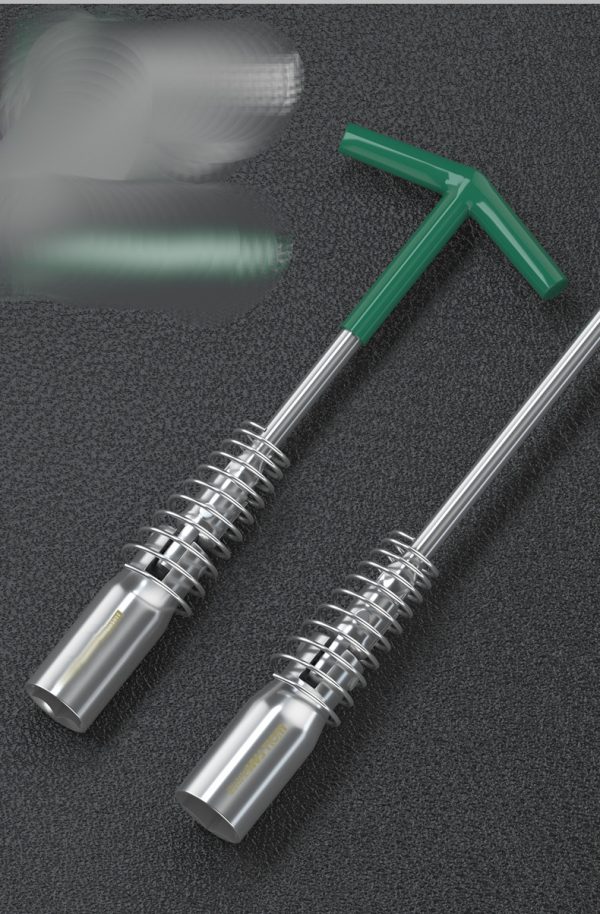 T-handle spark plug wrench with green handle and silver spring guard, displayed diagonally on a dark background.