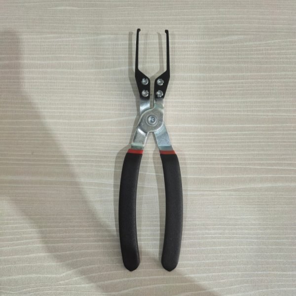 9-piece red and black automotive repair tool set featuring long nose pliers, hose clamp pliers, cutters, and a black anti-slip mechanic glove arranged on a white background.