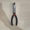 9-piece red and black automotive repair tool set featuring long nose pliers, hose clamp pliers, cutters, and a black anti-slip mechanic glove arranged on a white background.