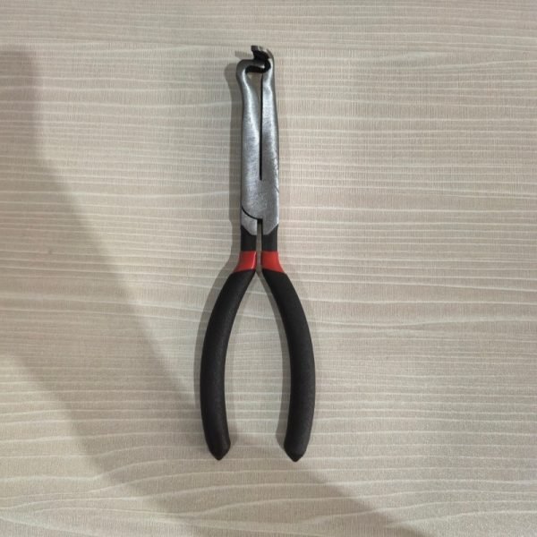 9-piece red and black automotive repair tool set featuring long nose pliers, hose clamp pliers, cutters, and a black anti-slip mechanic glove arranged on a white background.
