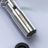 T-handle spark plug wrench with green handle and silver spring guard, displayed diagonally on a dark background.