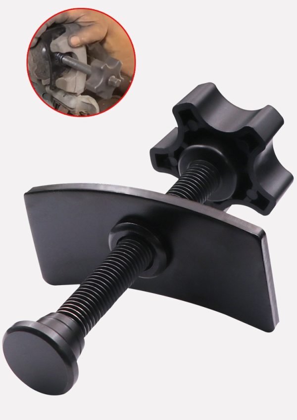Full view of the black brake caliper press tool showing the ergonomic nylon knob and curved pressure plate.