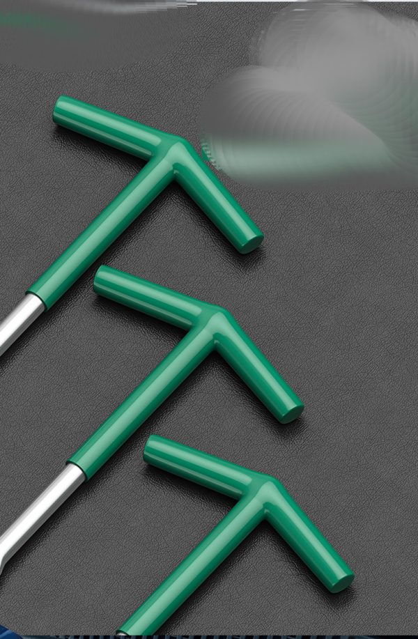 T-handle spark plug wrench with green handle and silver spring guard, displayed diagonally on a dark background.