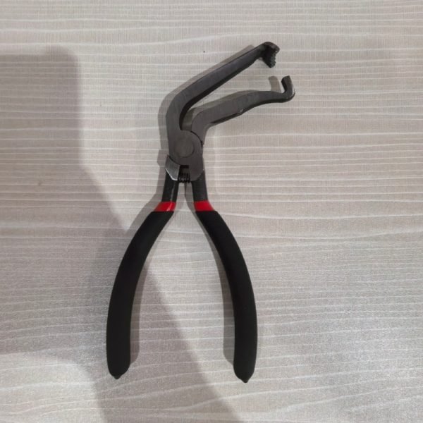9-piece red and black automotive repair tool set featuring long nose pliers, hose clamp pliers, cutters, and a black anti-slip mechanic glove arranged on a white background.