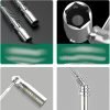 T-handle spark plug wrench with green handle and silver spring guard, displayed diagonally on a dark background.