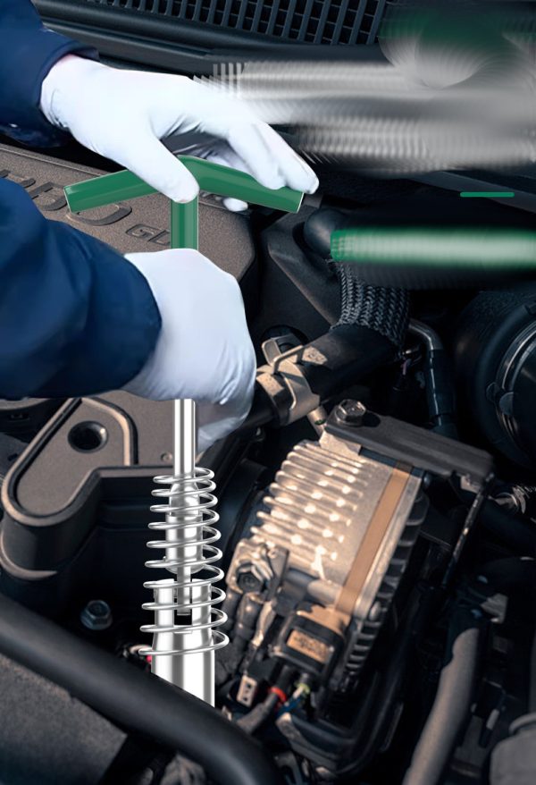 T-handle spark plug wrench with green handle and silver spring guard, displayed diagonally on a dark background.
