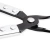 Open red case displaying an 11-piece valve stem seal tool kit with black pliers and chrome adapters organized by size.